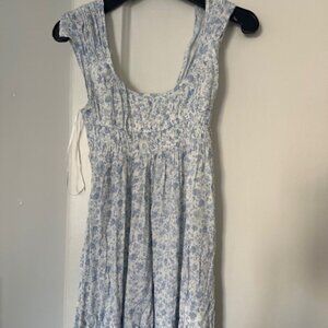 Brand new with tags Size Small We're All Pretty Girls Blue floral mini dress